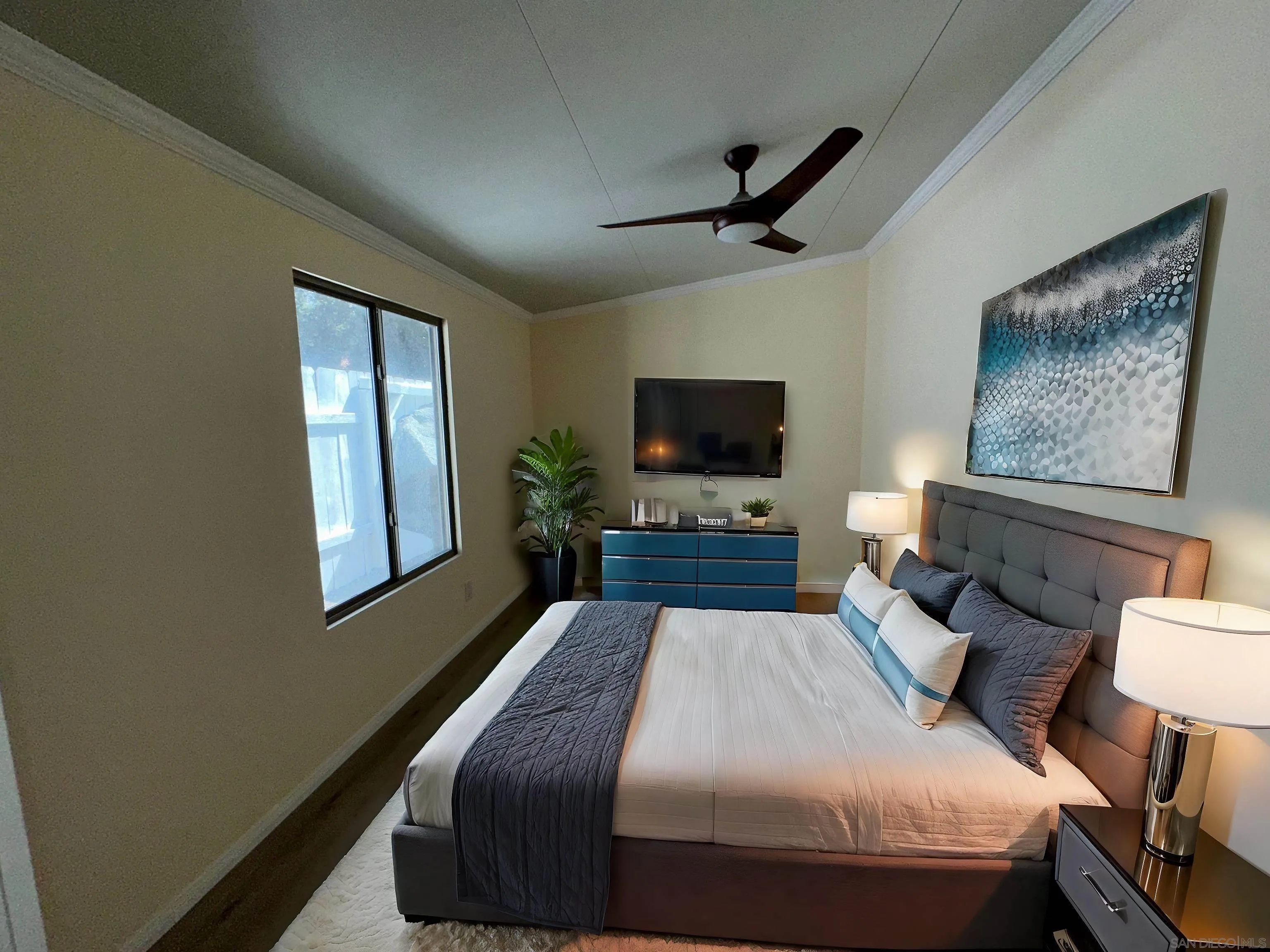 2441 Gladiola Drive Campo, CA 91906 - Photo 6 of 17 a bedroom with a bed and a flat screen tv