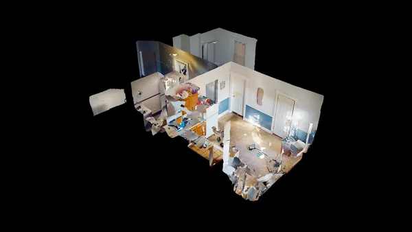 a picture of water heater room with wooden floor