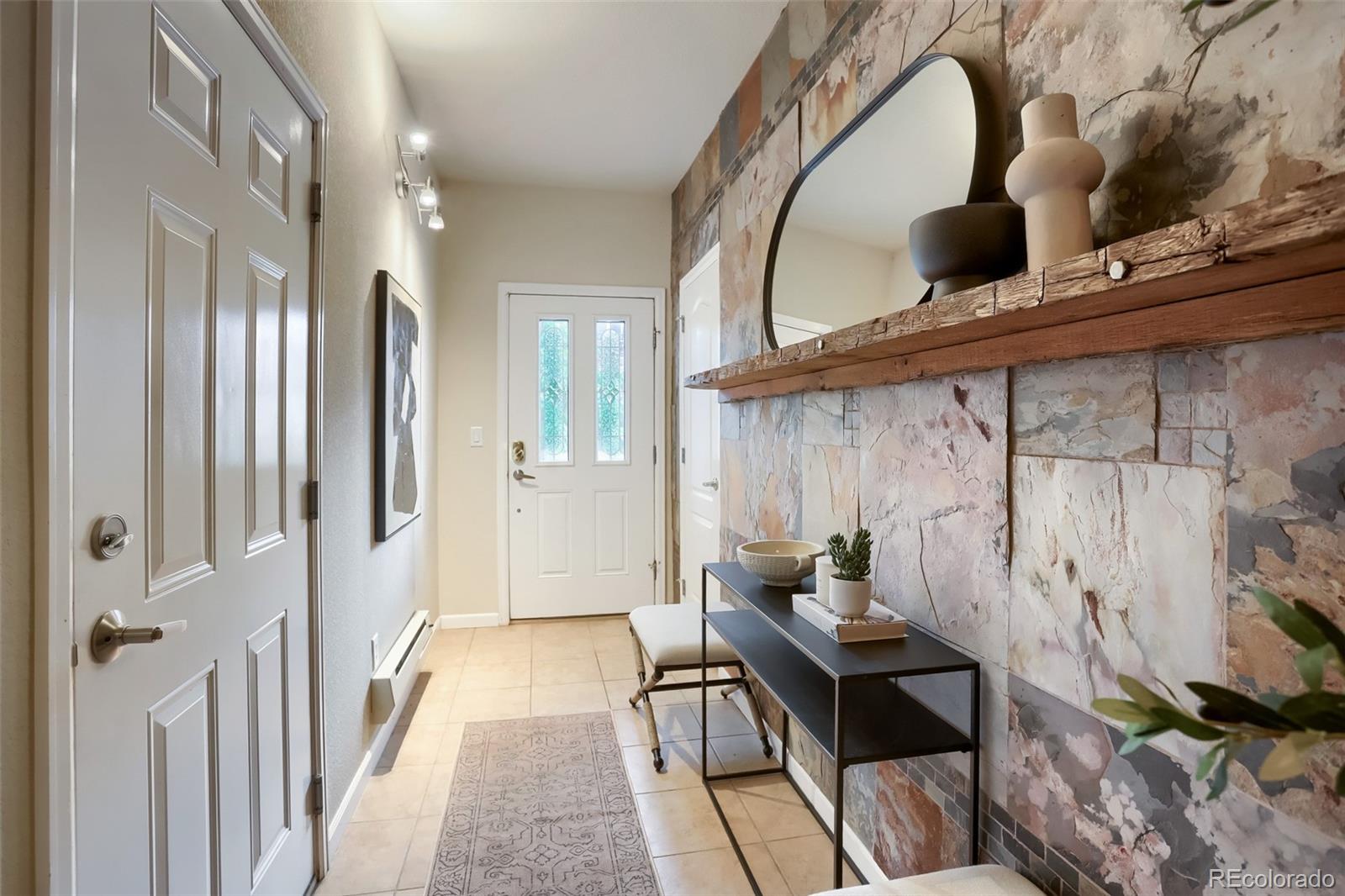6232 Kilmer Loop, Unit 203 Golden, CO 80403 - Photo 7 of 33 a living room with furniture
