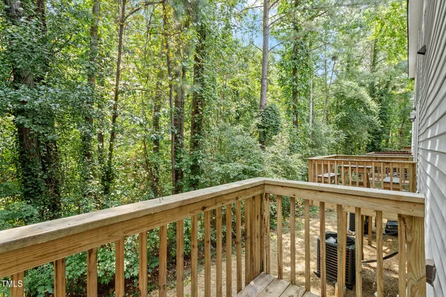 a view of a wooden fence