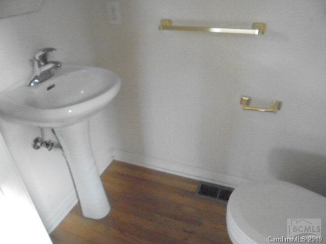 301 General Griffith Circle Rutherfordton, NC 28139 - Photo 13 of 17 a bathroom with a sink and toilet