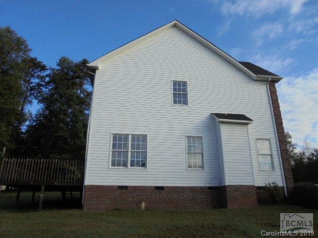 301 General Griffith Circle Rutherfordton, NC 28139 - Photo 17 of 17 a view of house with backyard