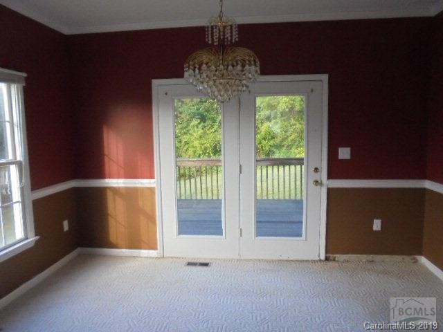 301 General Griffith Circle Rutherfordton, NC 28139 - Photo 10 of 17 a view of an empty room with a window