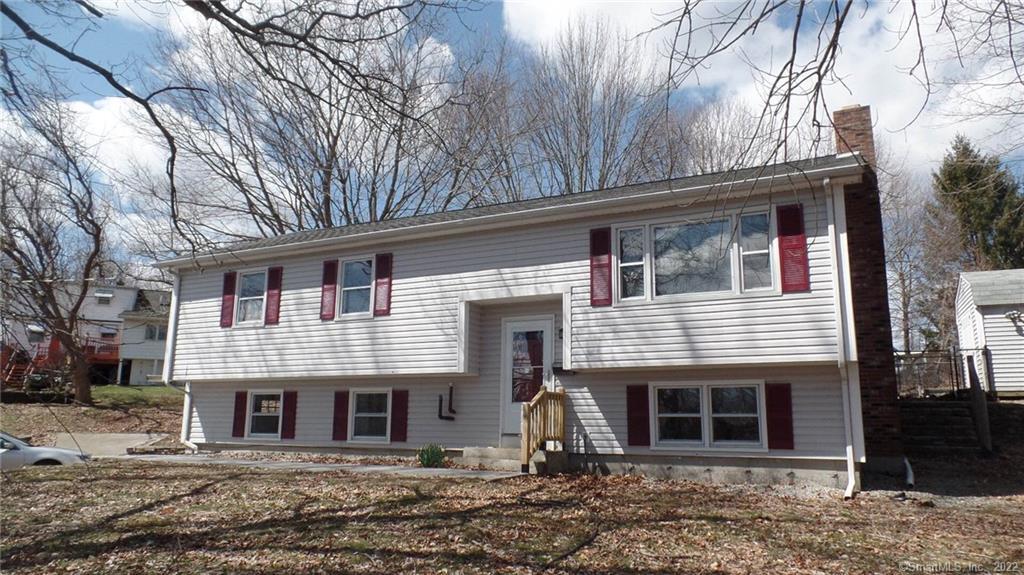290 Harland Road Norwich, CT 06360 - Photo 1 of 1 a front view of a house with large windows