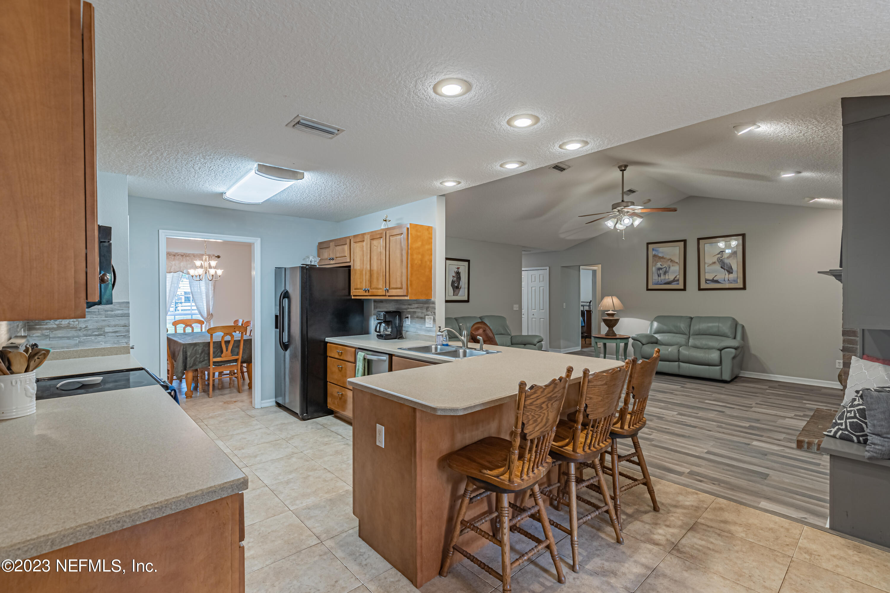 1193 Marlee Road St. Johns, FL 32259 - Photo 15 of 63 a large kitchen with a table and chairs in it