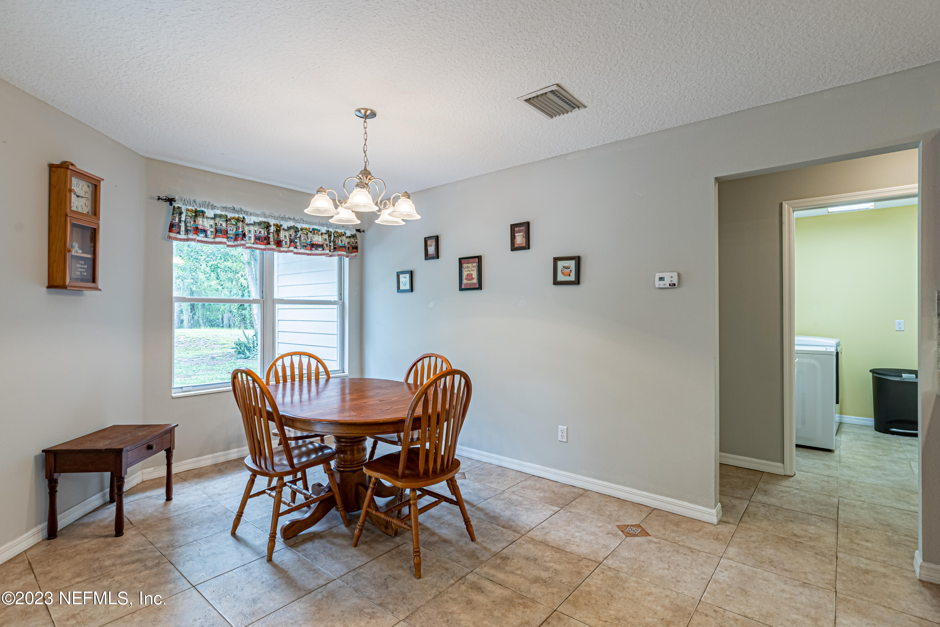 1193 Marlee Road St. Johns, FL 32259 - Photo 19 of 63 a dining room with furniture window and outside view