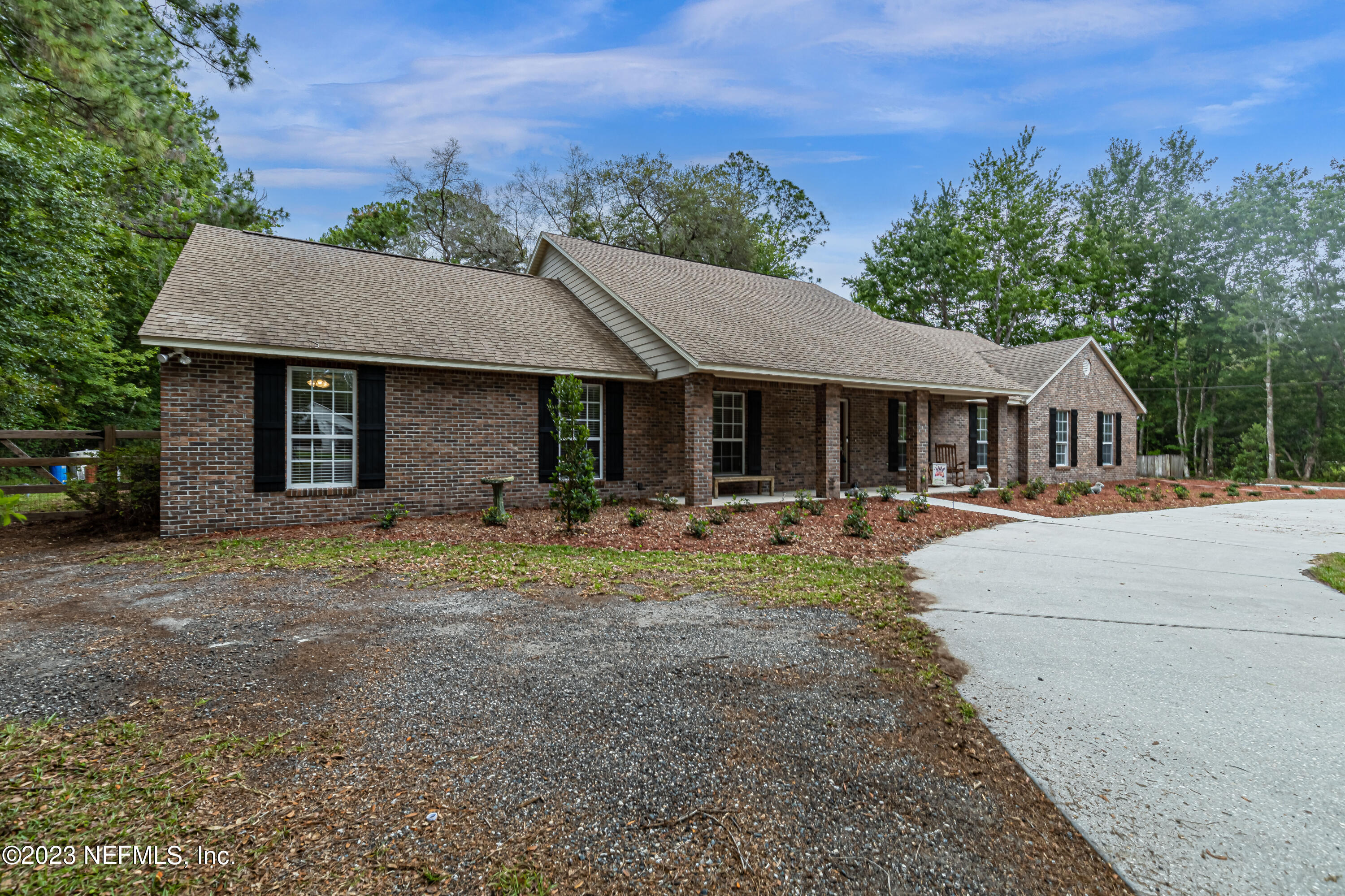 1193 Marlee Road St. Johns, FL 32259 - Photo 3 of 63 a front view of a house with yard and green space