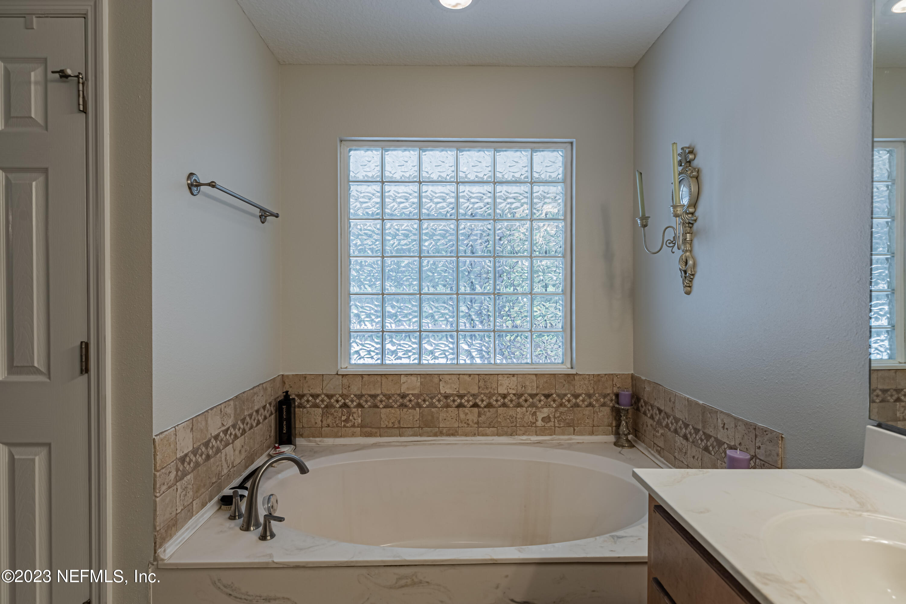 1193 Marlee Road St. Johns, FL 32259 - Photo 35 of 63 a bath tub sitting next to a window