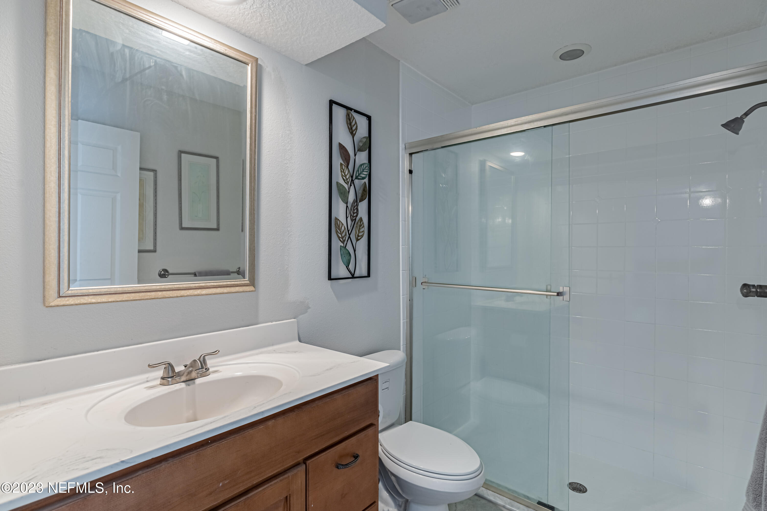 1193 Marlee Road St. Johns, FL 32259 - Photo 39 of 63 a bathroom with a sink a toilet and shower