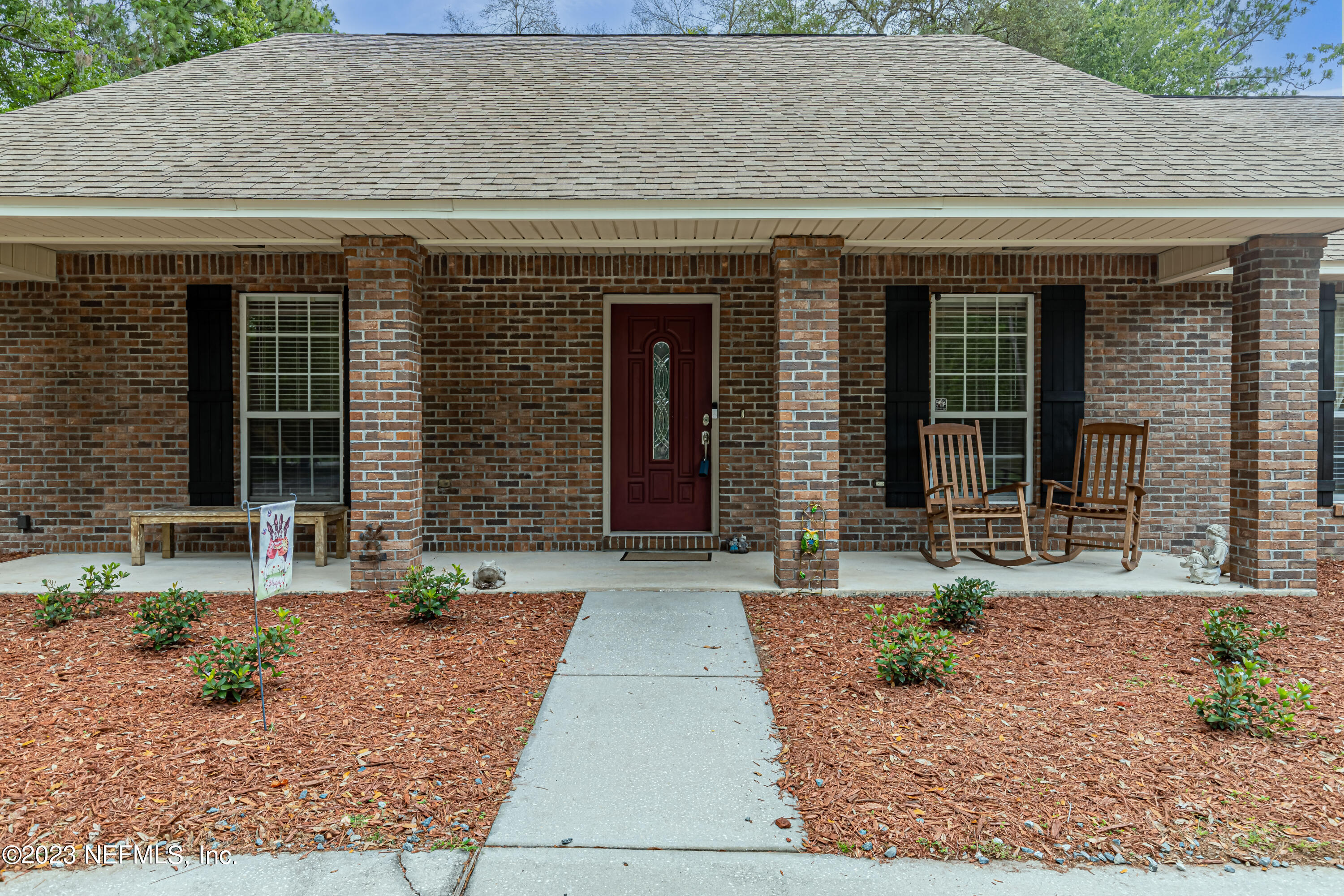 1193 Marlee Road St. Johns, FL 32259 - Photo 4 of 63 a front view of a house with garden