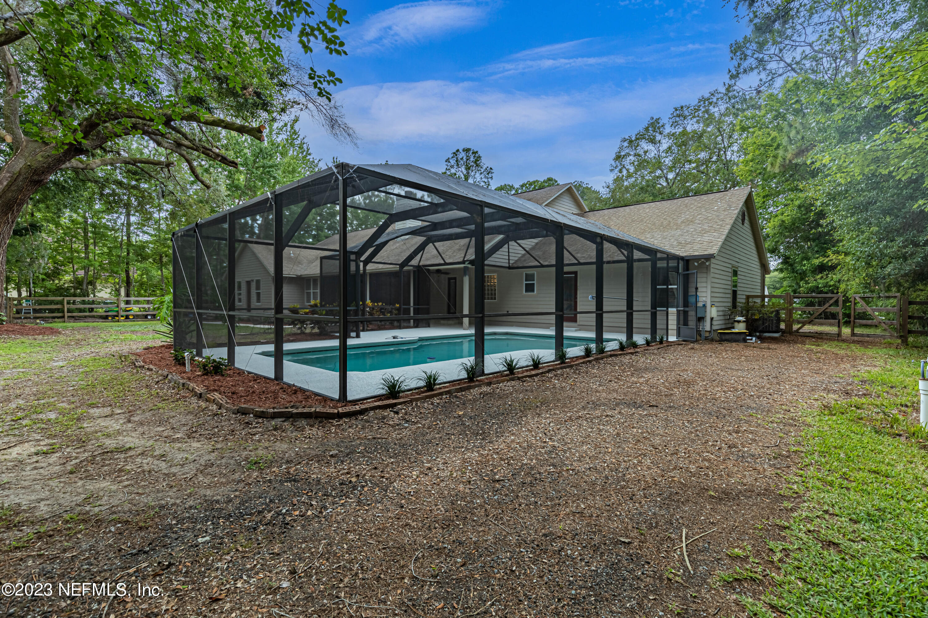 1193 Marlee Road St. Johns, FL 32259 - Photo 48 of 63 a view of a house with backyard and trees
