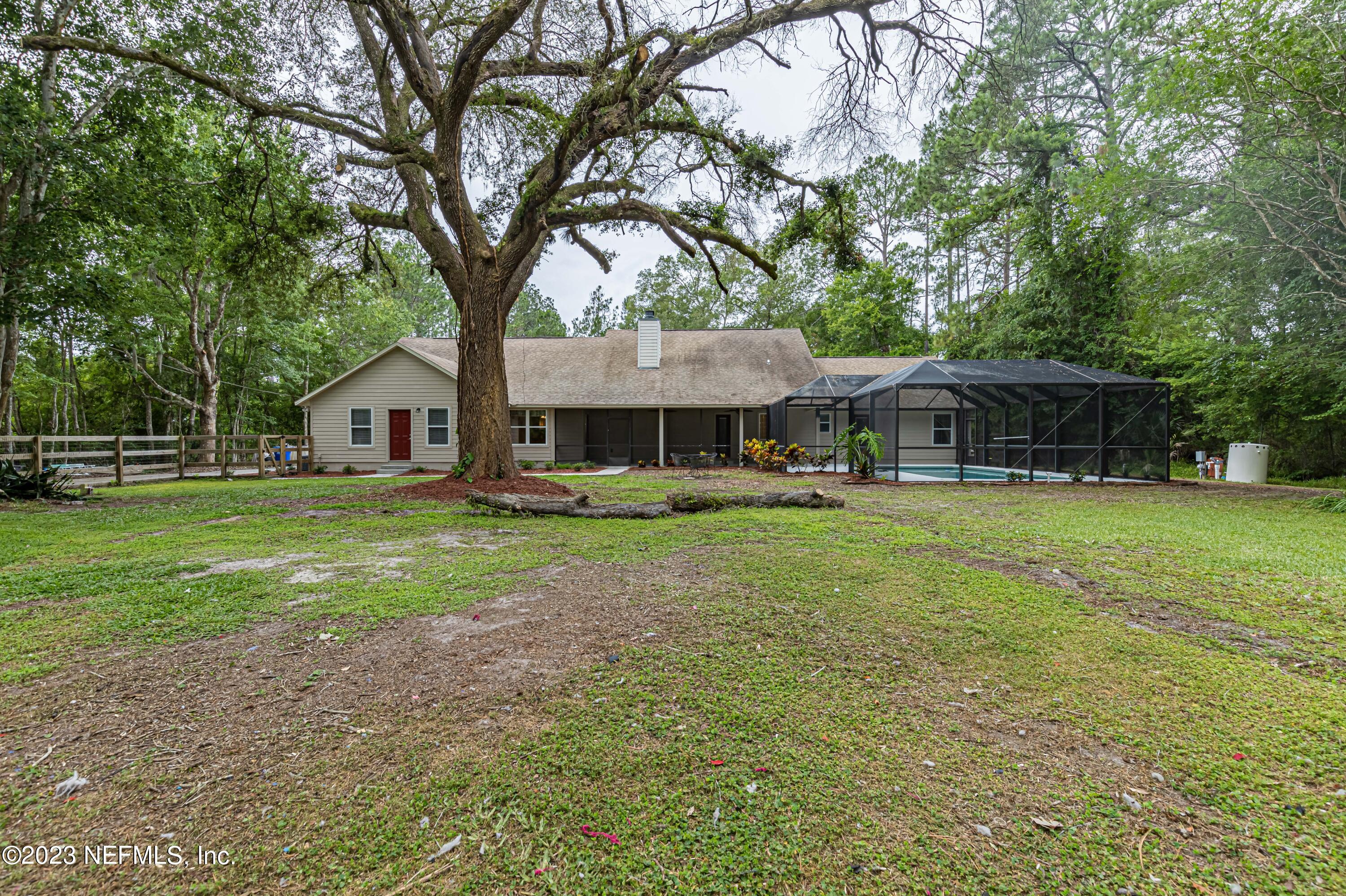 1193 Marlee Road St. Johns, FL 32259 - Photo 49 of 63 a front view of a house with garden