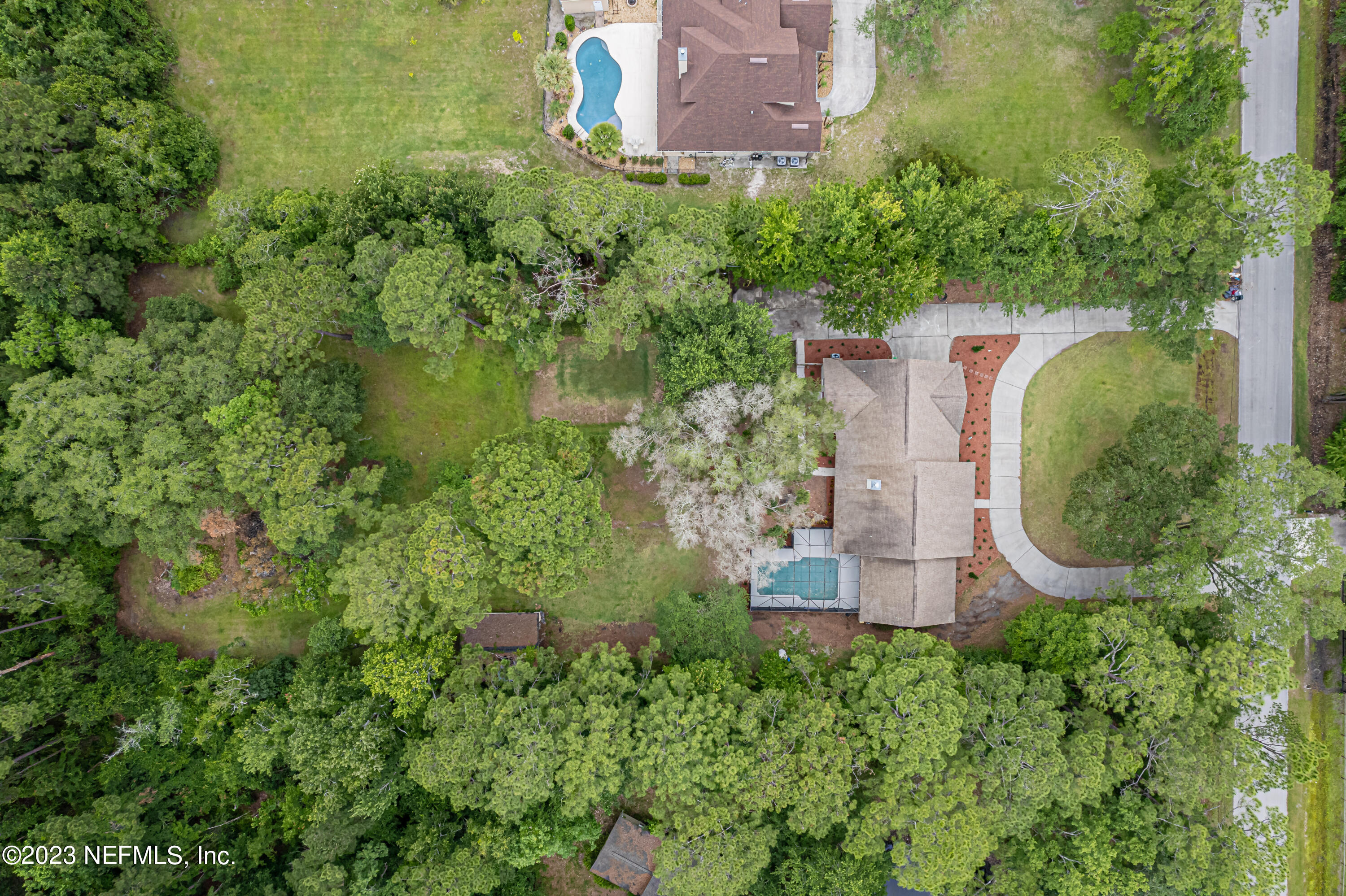1193 Marlee Road St. Johns, FL 32259 - Photo 57 of 63 an aerial view of a house with a yard and lake view
