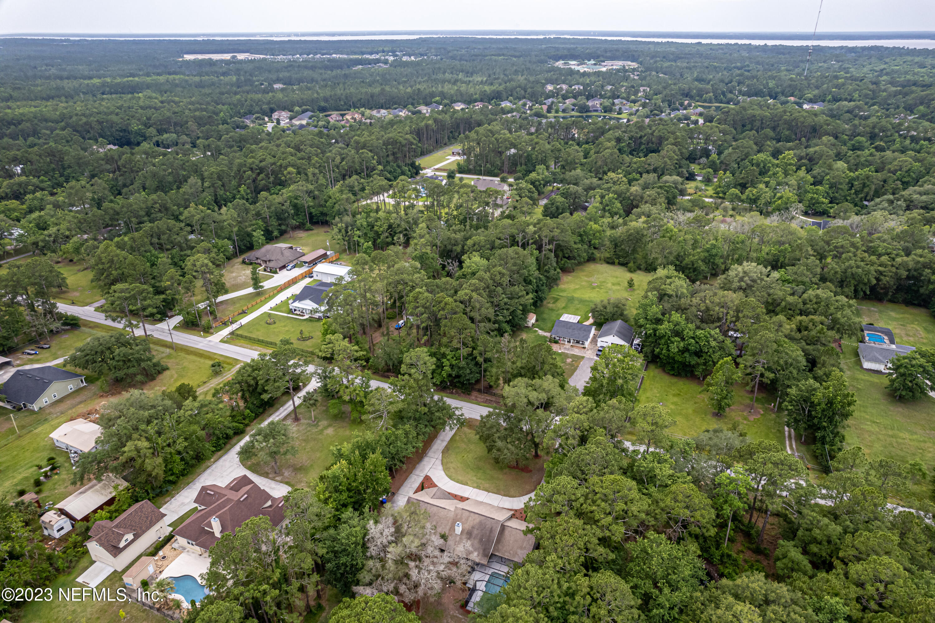 1193 Marlee Road St. Johns, FL 32259 - Photo 58 of 63 an aerial view of residential house with outdoor space and trees