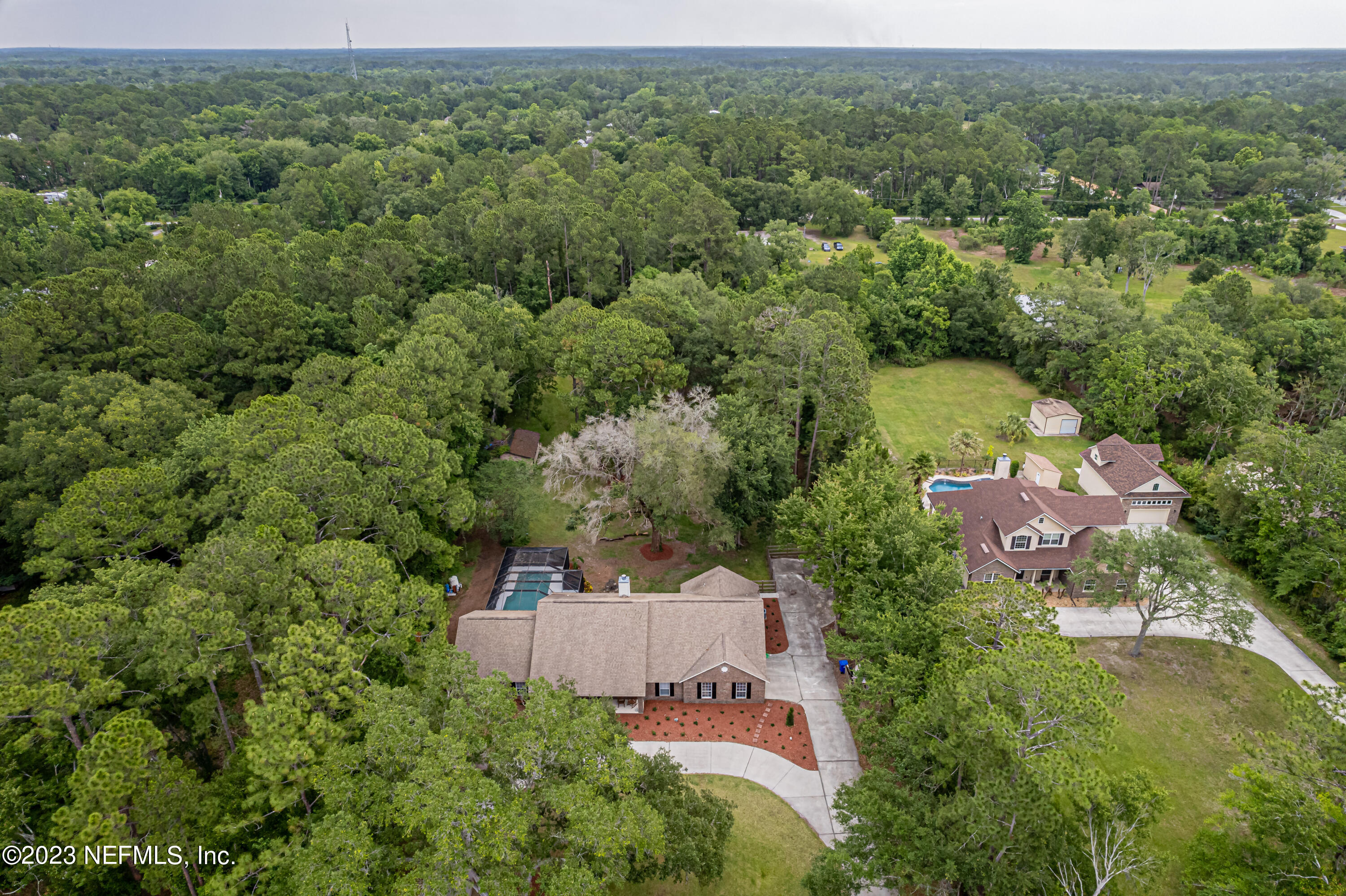 1193 Marlee Road St. Johns, FL 32259 - Photo 62 of 63 an aerial view of a house with a yard