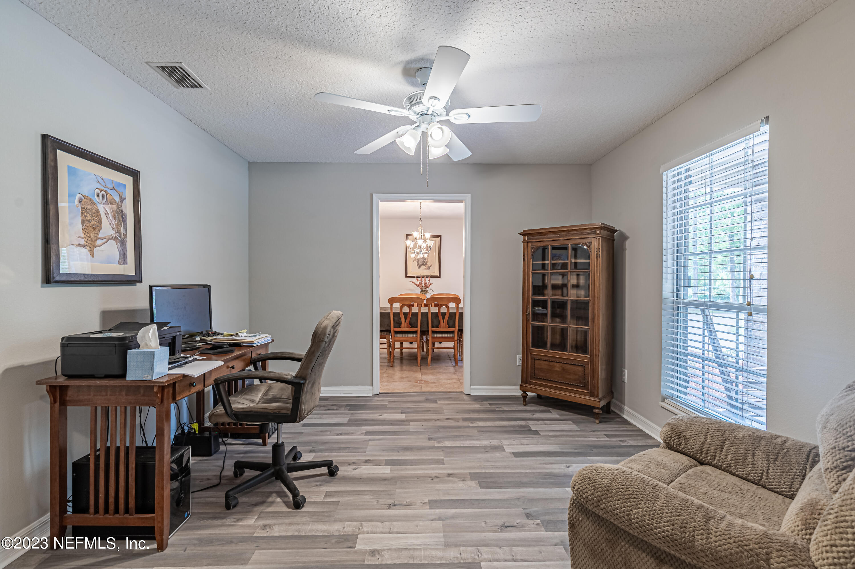 1193 Marlee Road St. Johns, FL 32259 - Photo 7 of 63 a living room with furniture and wooden floor