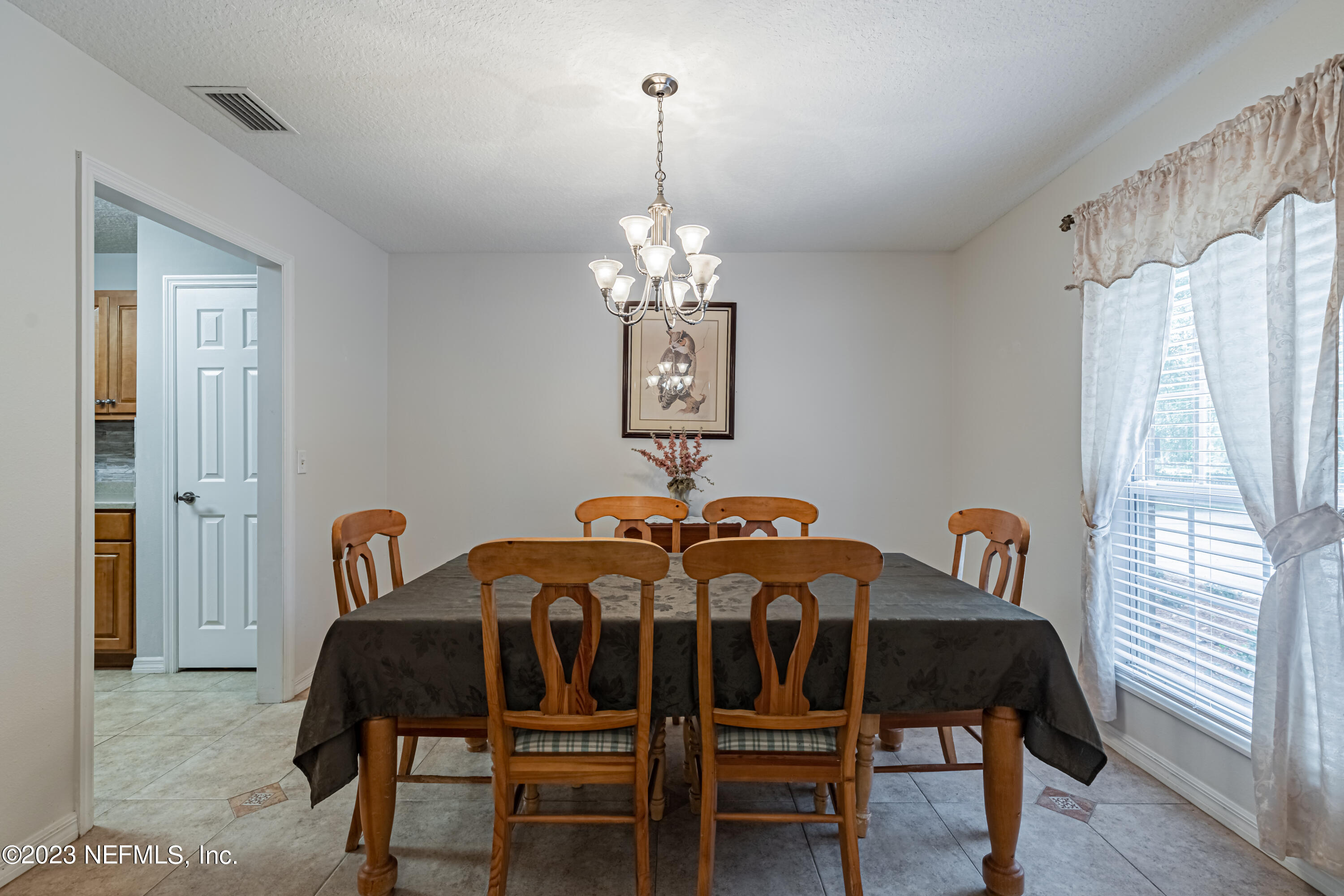 1193 Marlee Road St. Johns, FL 32259 - Photo 9 of 63 a dining room with furniture and window