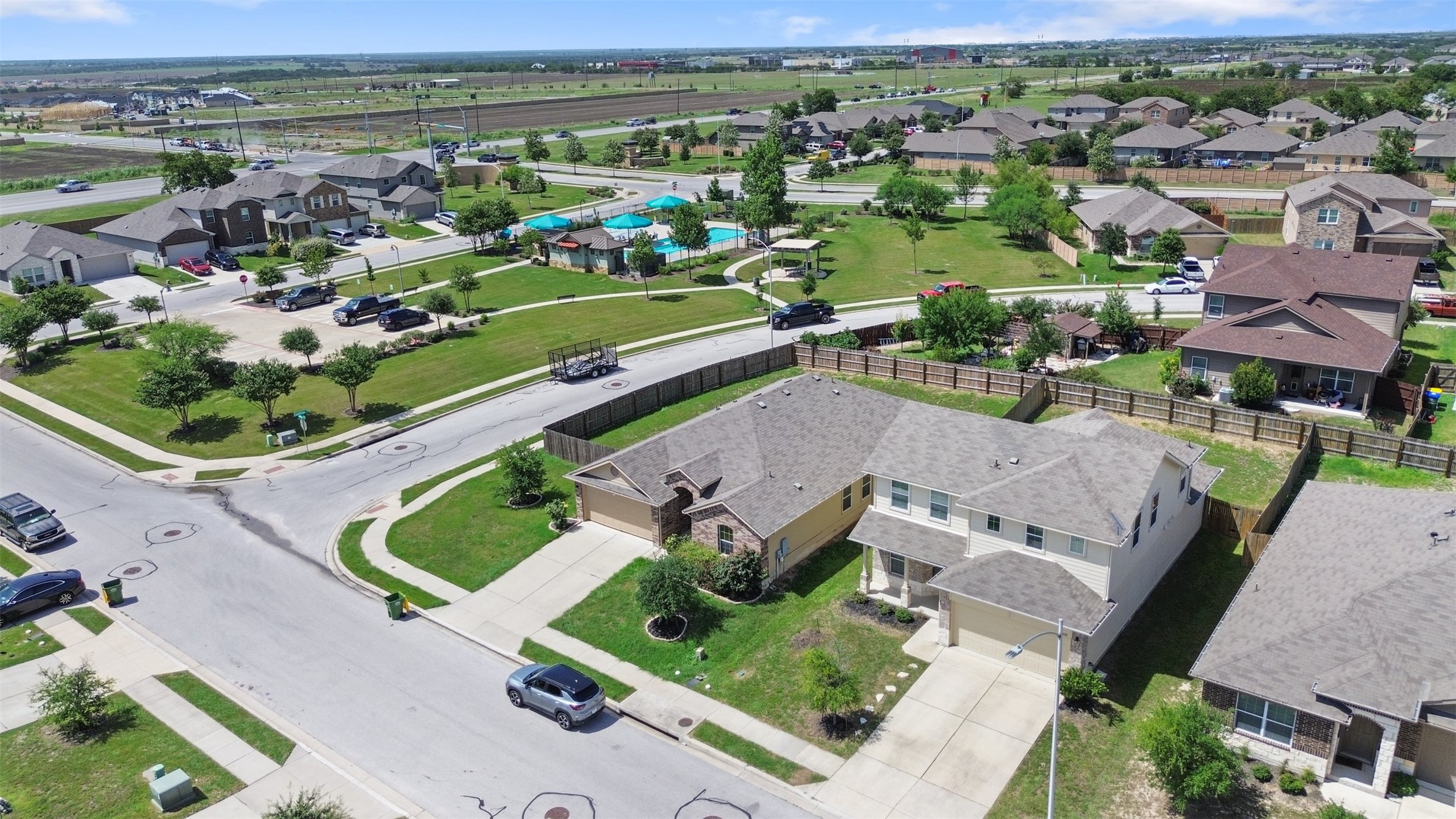 an aerial view of a house with a garden