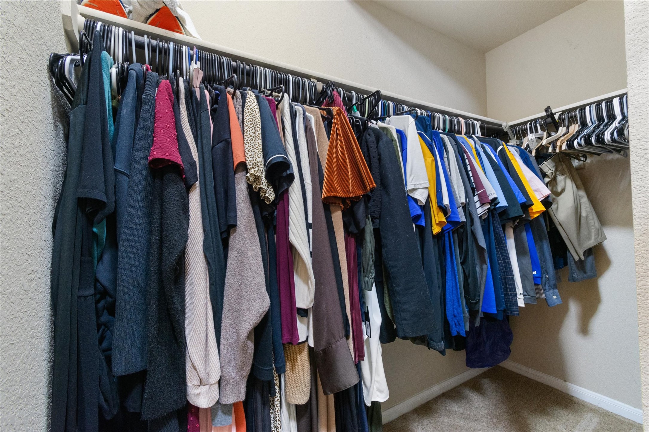 11620 Carbrook Road Manor, TX 78653 - Photo 17 of 40 a close up view of a walk in closet