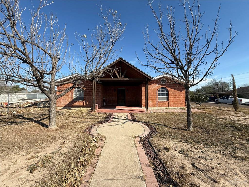 1101 Barnes Street Mission, TX 78572 - Photo 1 of 1 a view of a house with a yard covered in snow