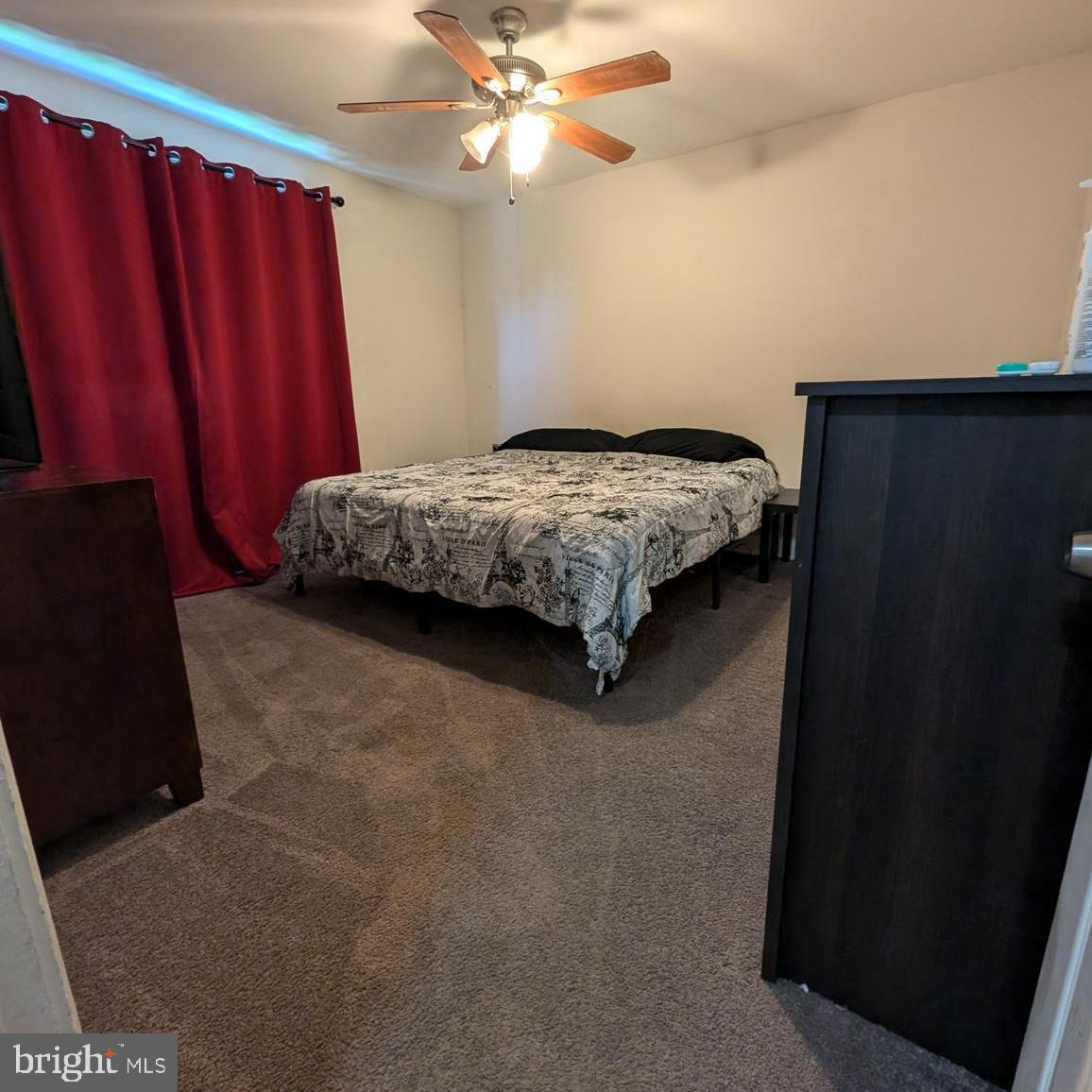 4219 Colborne Road Baltimore, MD 21229 - Photo 13 of 22 a bedroom with a bed and a closet