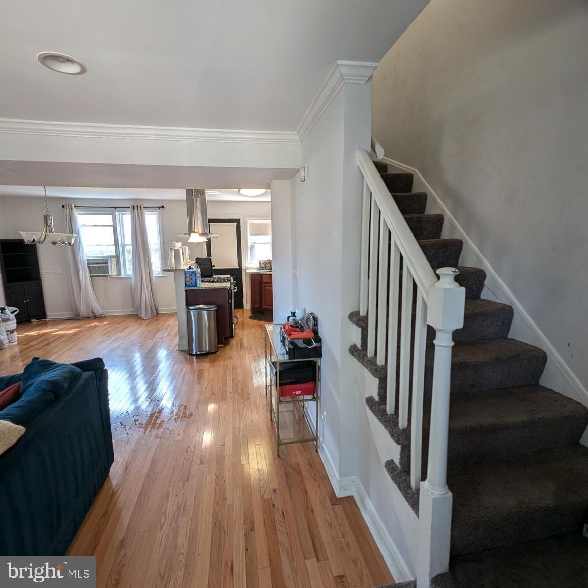 4219 Colborne Road Baltimore, MD 21229 - Photo 2 of 22 a view of a living room and entryway with wooden floor