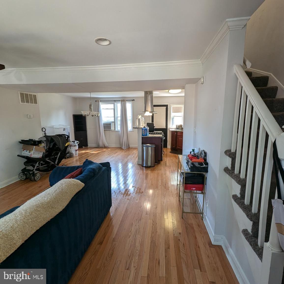 4219 Colborne Road Baltimore, MD 21229 - Photo 3 of 22 a living room with furniture and a wooden floor