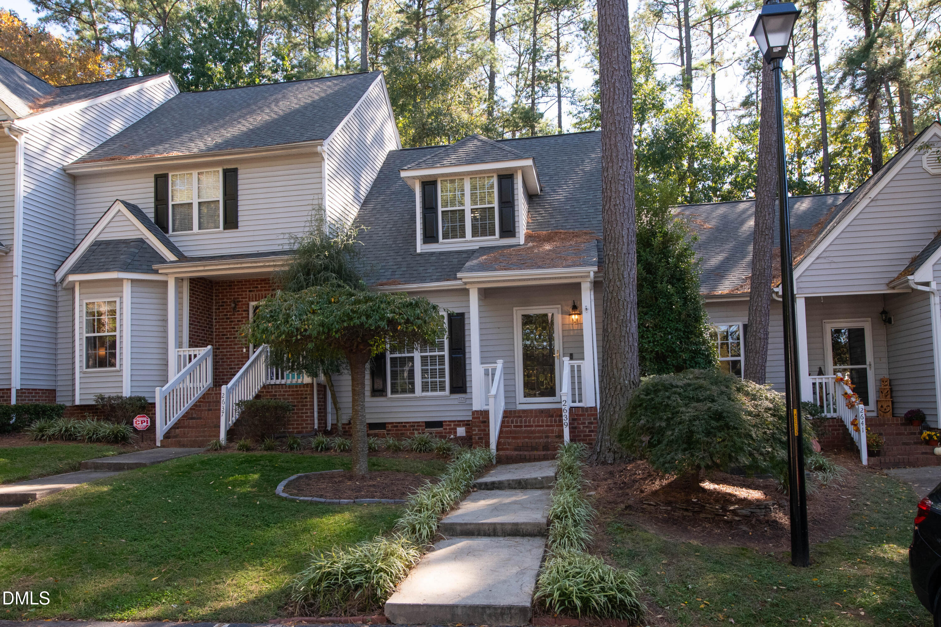 2639 Broad Oaks Place Raleigh, NC 27603 - Photo 1 of 24 a front view of a house with a yard