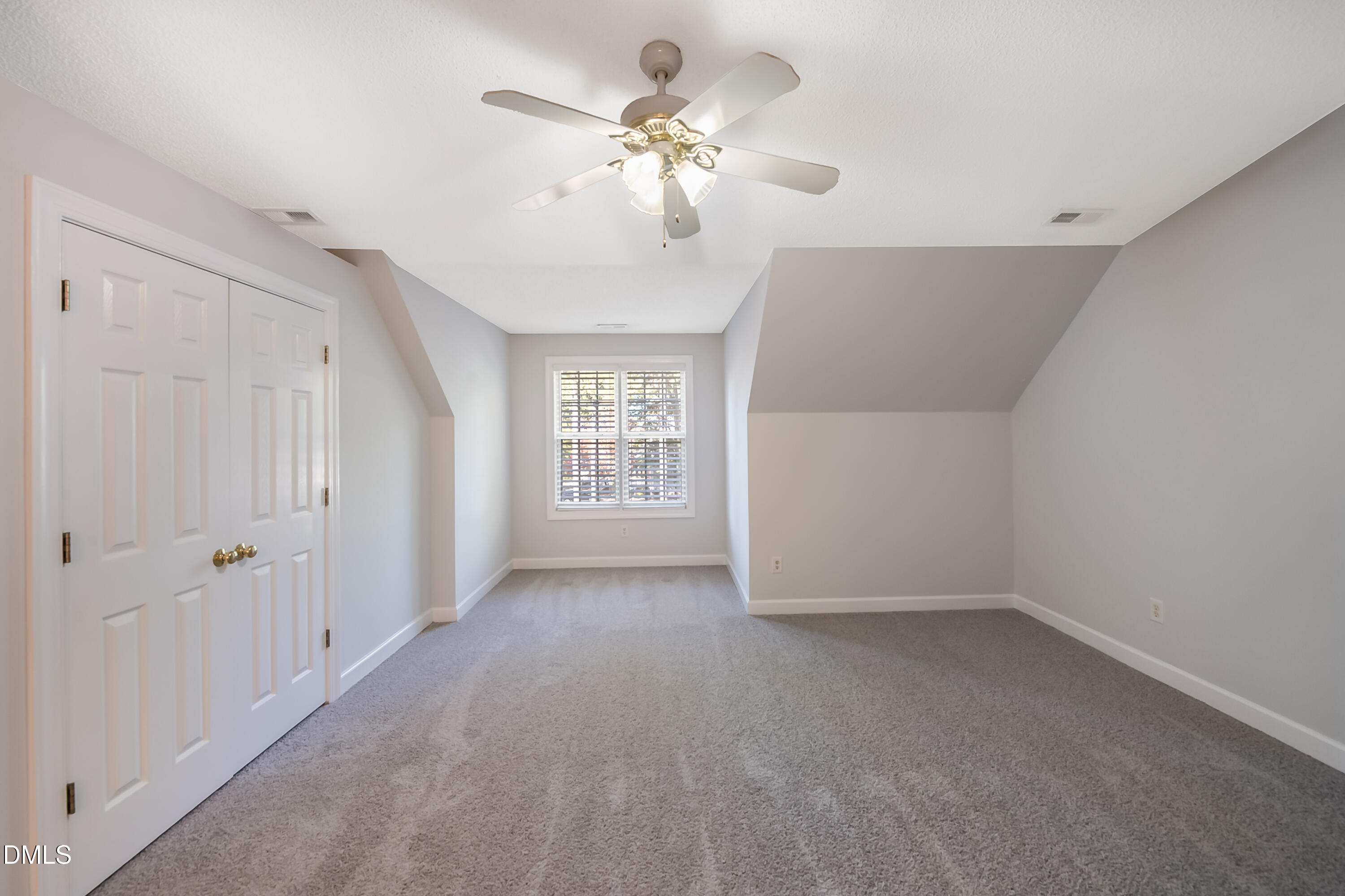 2639 Broad Oaks Place Raleigh, NC 27603 - Photo 17 of 24 wooden floor in an empty room with a window