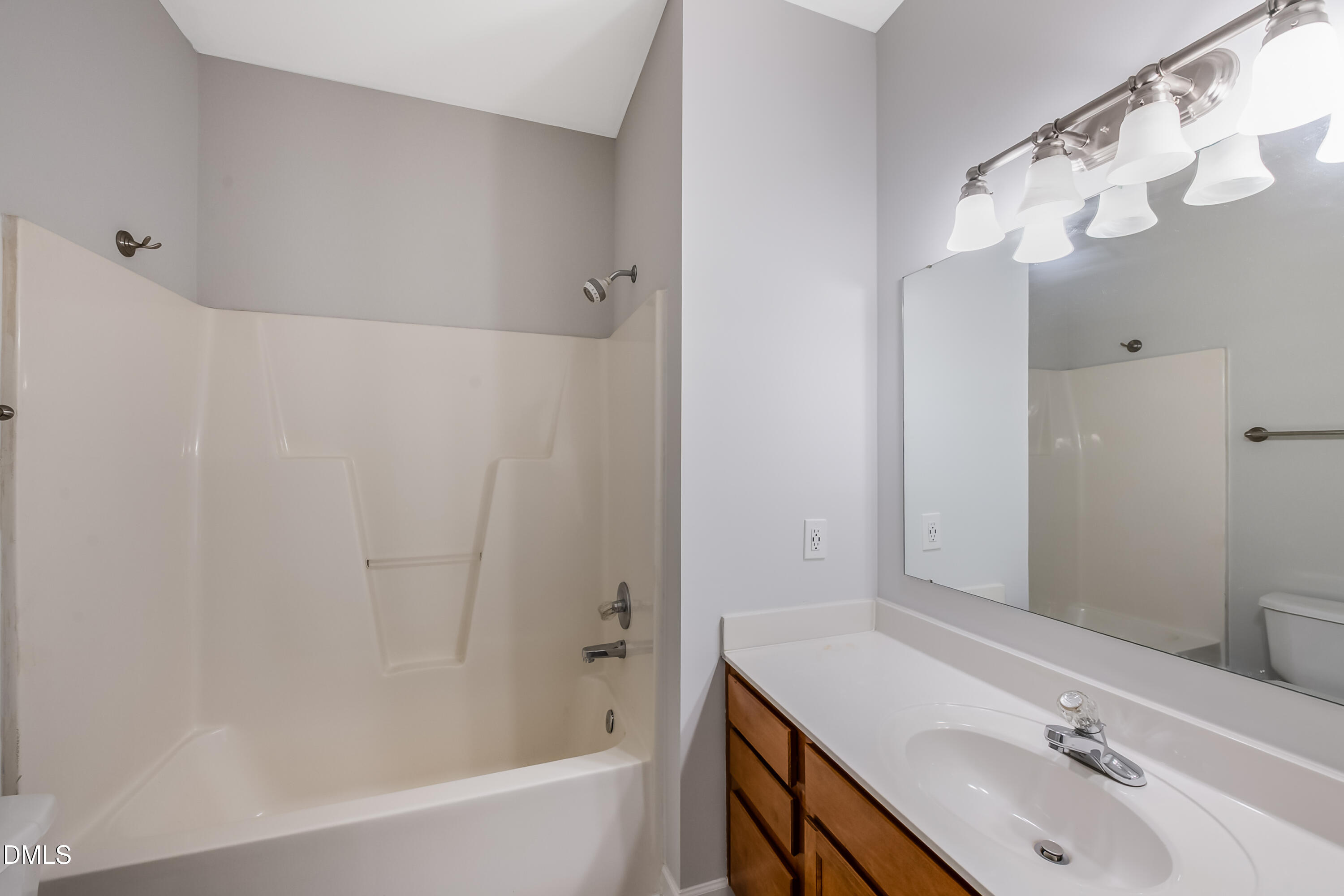 2639 Broad Oaks Place Raleigh, NC 27603 - Photo 6 of 24 a bathroom with a sink and a mirror