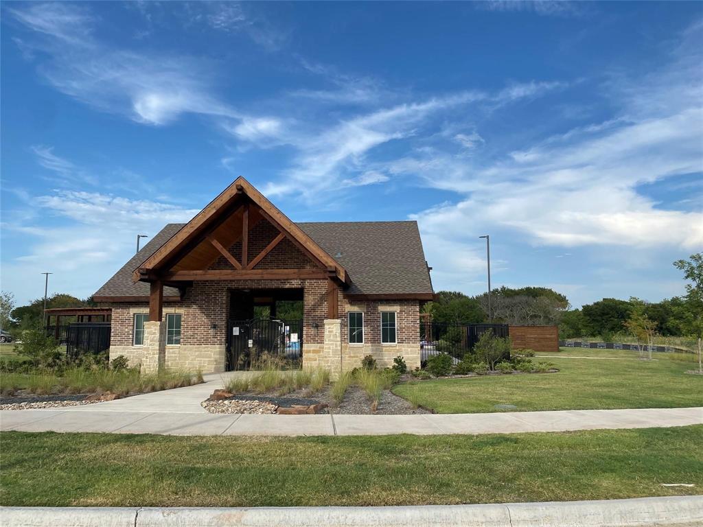 1215 Fairford Road Crandall, TX 75114 - Photo 14 of 17 front view of a house with a yard