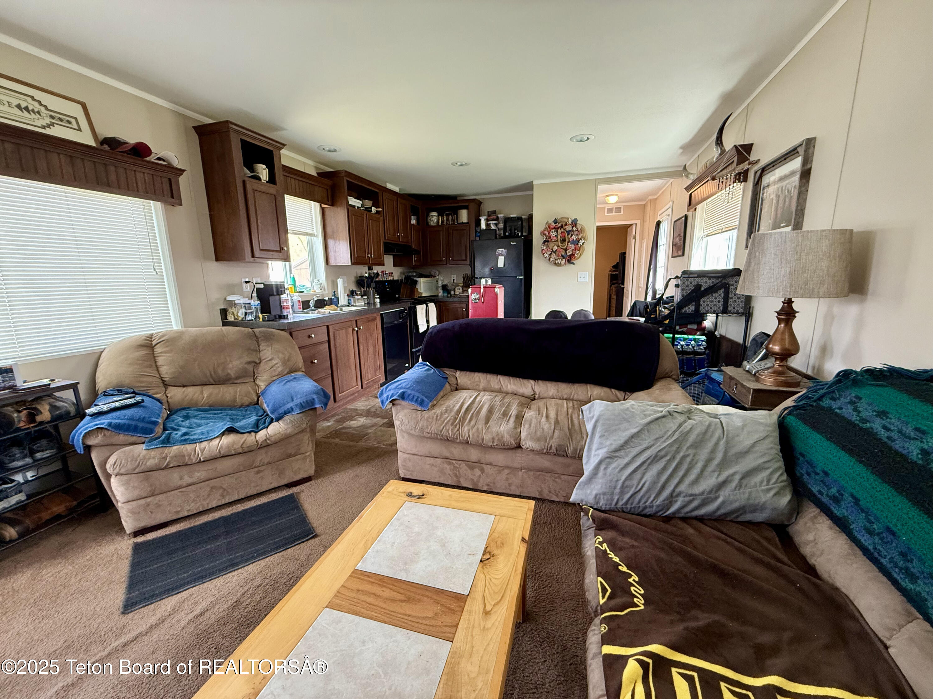 7250 Highway 89, Unit 4 Jackson, WY 83001 - Photo 4 of 13 Living Room w Kitchen