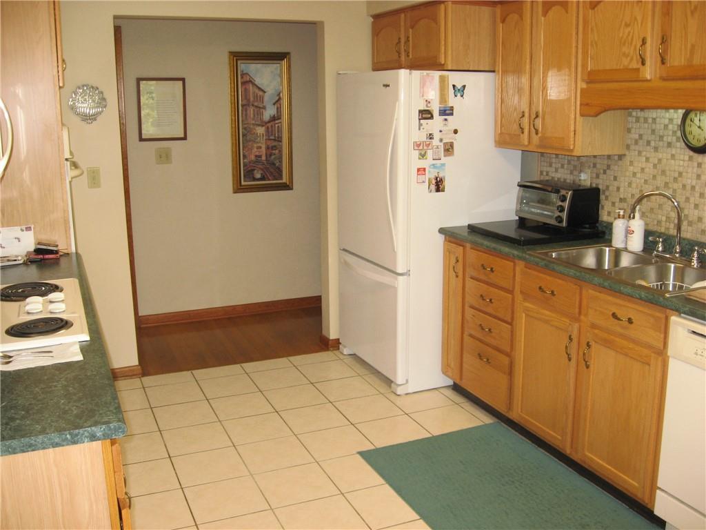 548 Ridgeview Road Mount Pleasant, PA 15666 - Photo 11 of 23 Kitchen area that leads to the hallway - bedrooms and baths