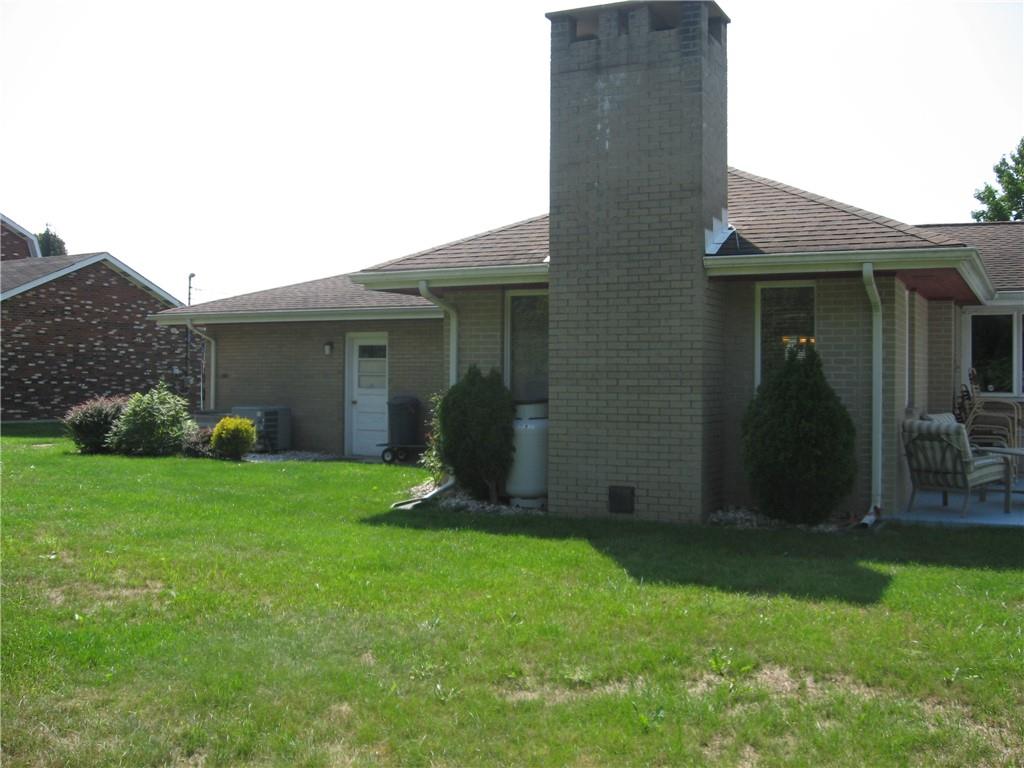 548 Ridgeview Road Mount Pleasant, PA 15666 - Photo 5 of 23 Access to the garage and propane tank for fireplace.