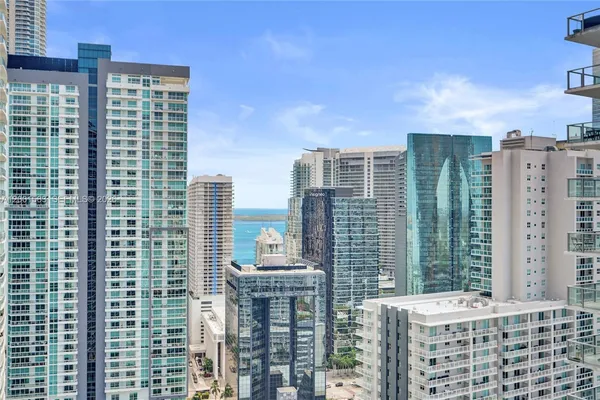a view of a city with tall buildings