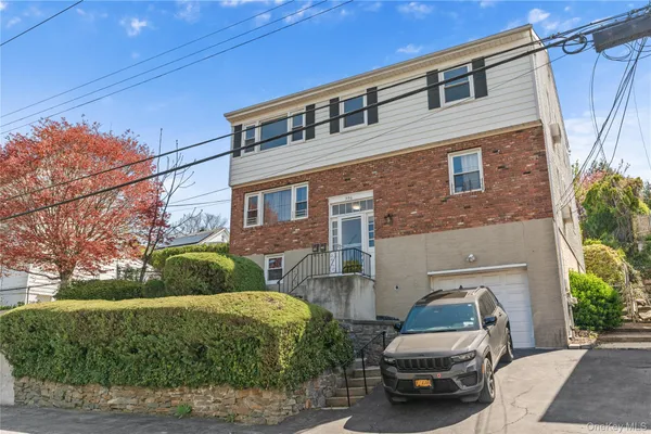 a car parked in front of a house