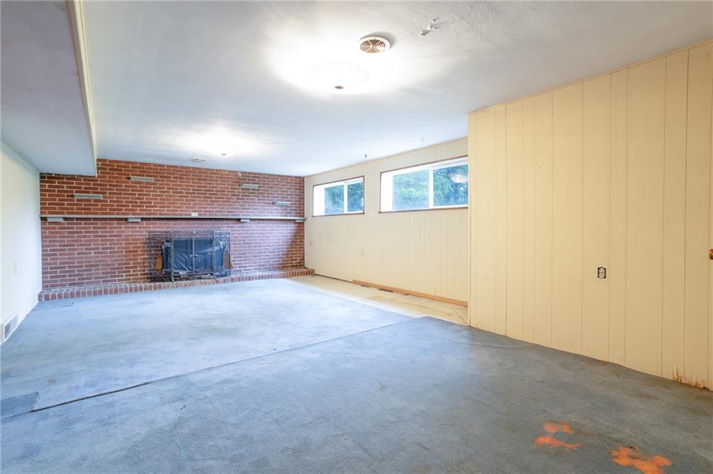 497 Ross Road Eighty Four, PA 15330 - Photo 29 of 35 a view of empty room with a fireplace