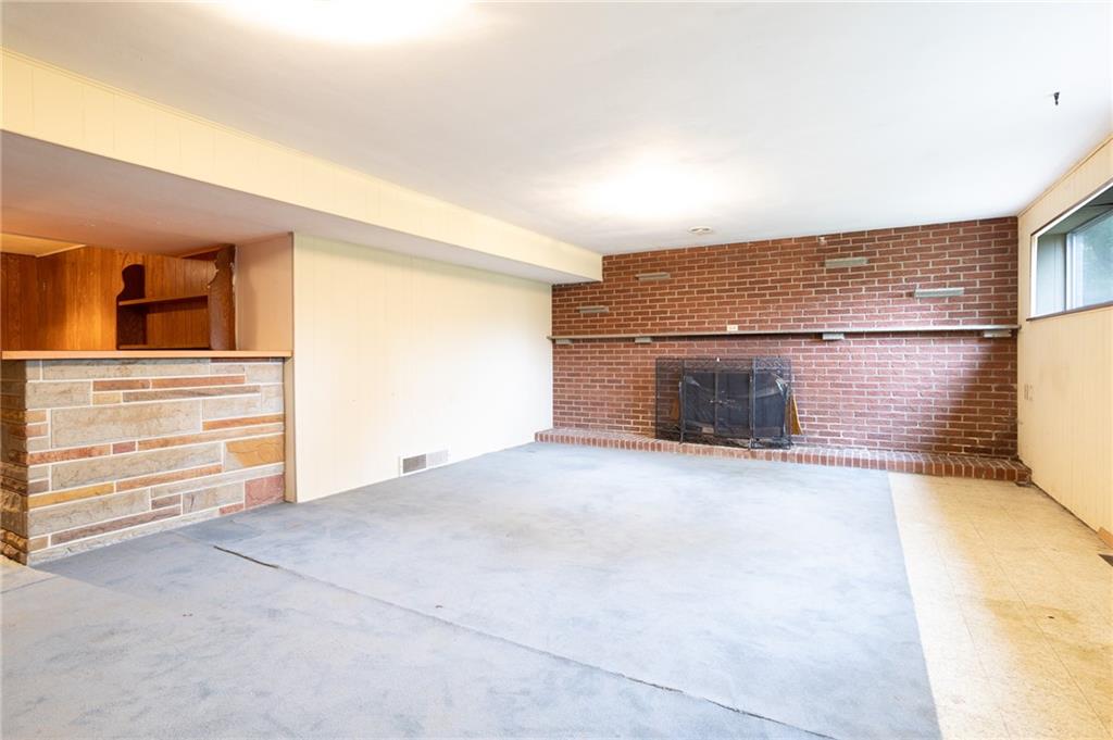 497 Ross Road Eighty Four, PA 15330 - Photo 30 of 35 a view of empty room with wooden floor and fan