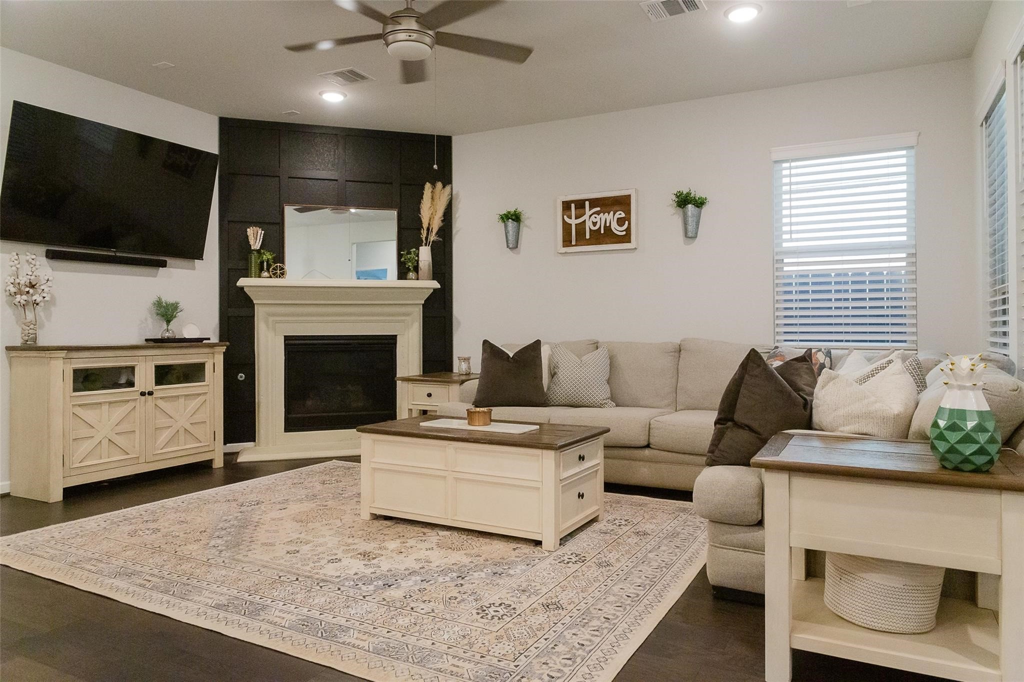 385 Weimer Lagoon Road La Porte, TX 77571 - Photo 7 of 22 Cozy living room with ample natural light from multiple windows, creating a welcoming atmosphere.