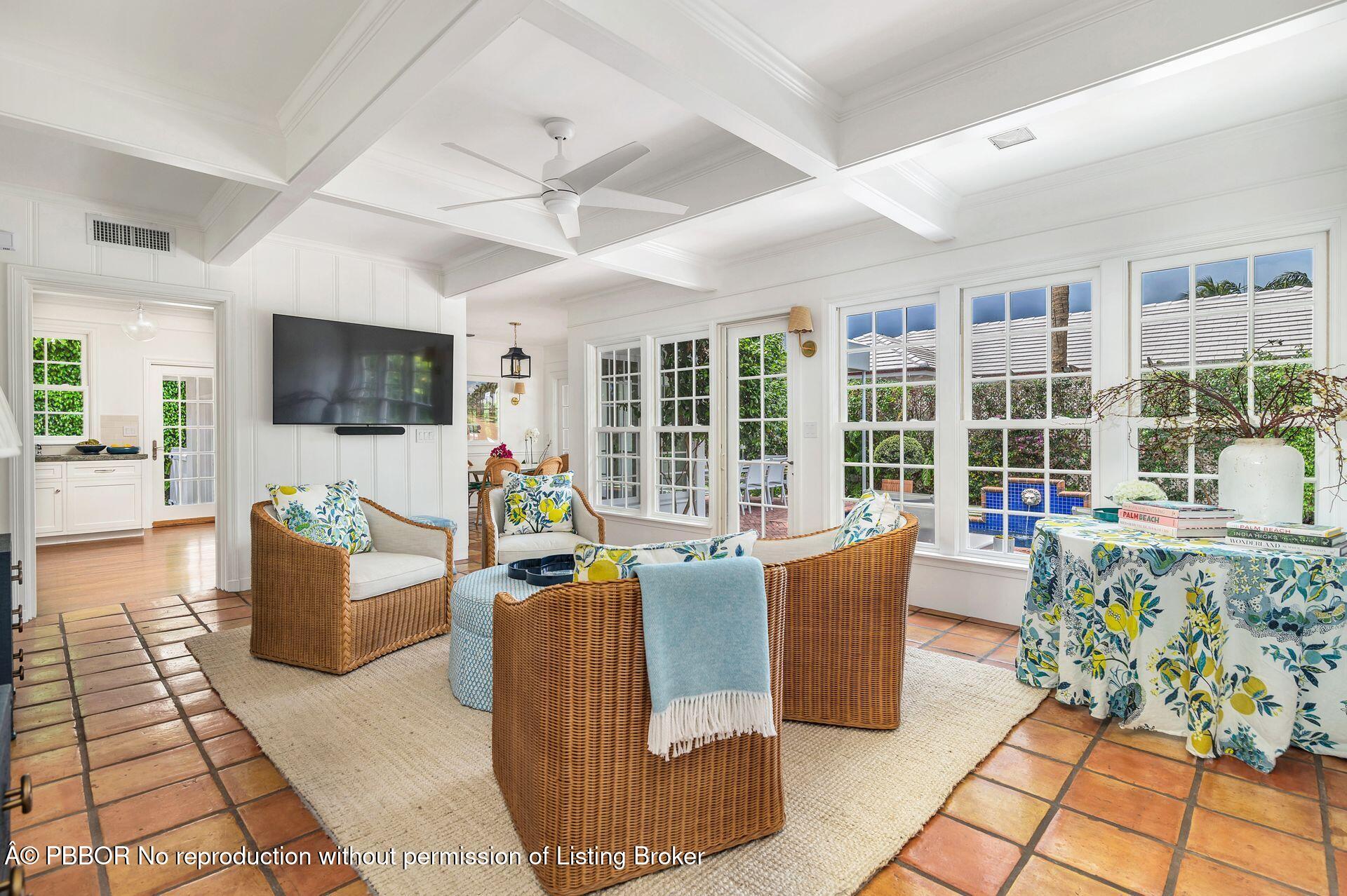 255 Colonial Lane Palm Beach, FL 33480 - Photo 6 of 32 a living room with furniture and a flat screen tv