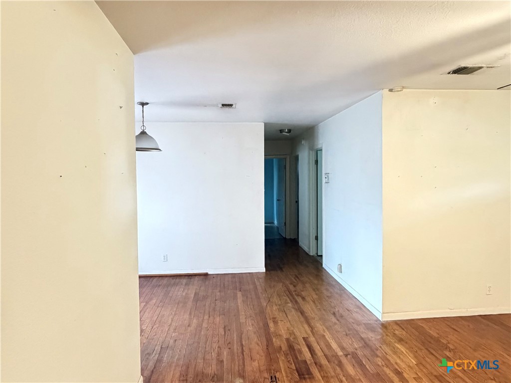 1902 Navidad Street Victoria, TX 77901 - Photo 10 of 23 a view of hallway with wooden floor