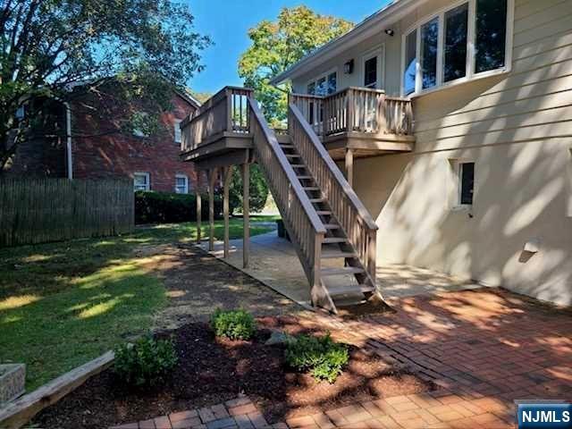 32 Rock Road Englewood Cliffs, NJ 07632 - Photo 27 of 30 a view of a house with a yard