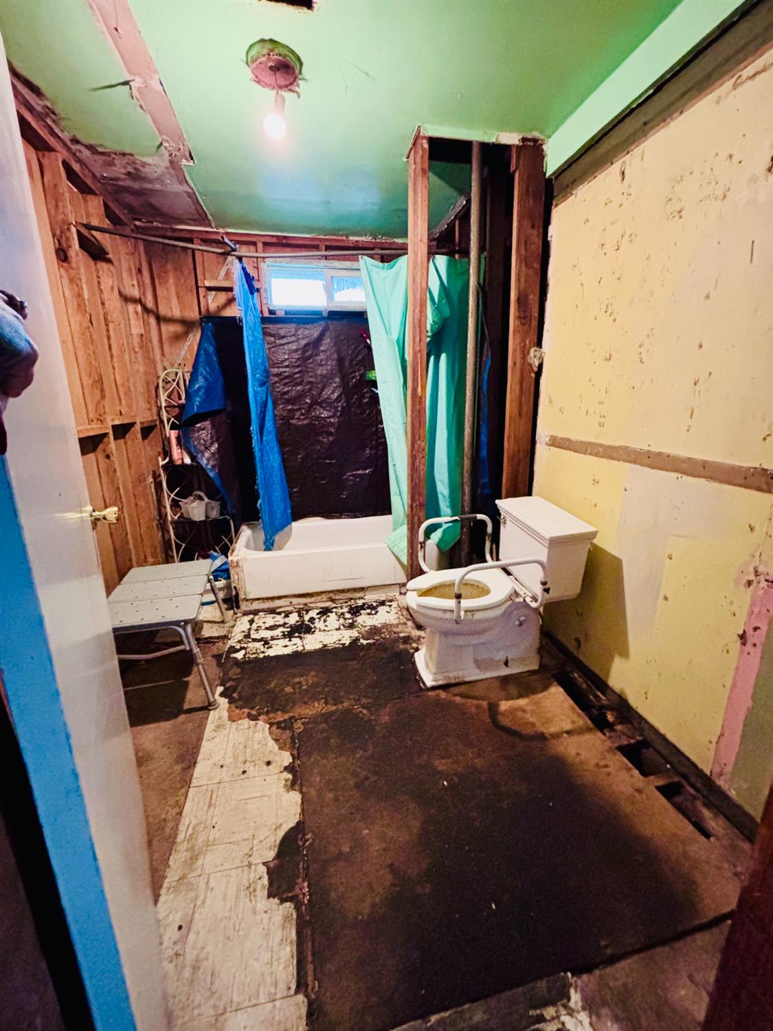 1141 E Street Stockton, CA 95205 - Photo 10 of 13 a view of walk in closet with clothes and shoes