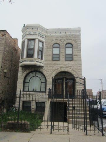 3010 West Fulton Street, Unit 3 Chicago, IL 60612 - Photo 1 of 1 a view of building with glass windows