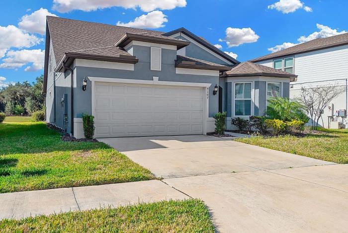 9107 Rally Spring Loop Wesley Chapel, FL 33543 - Photo 7 of 63