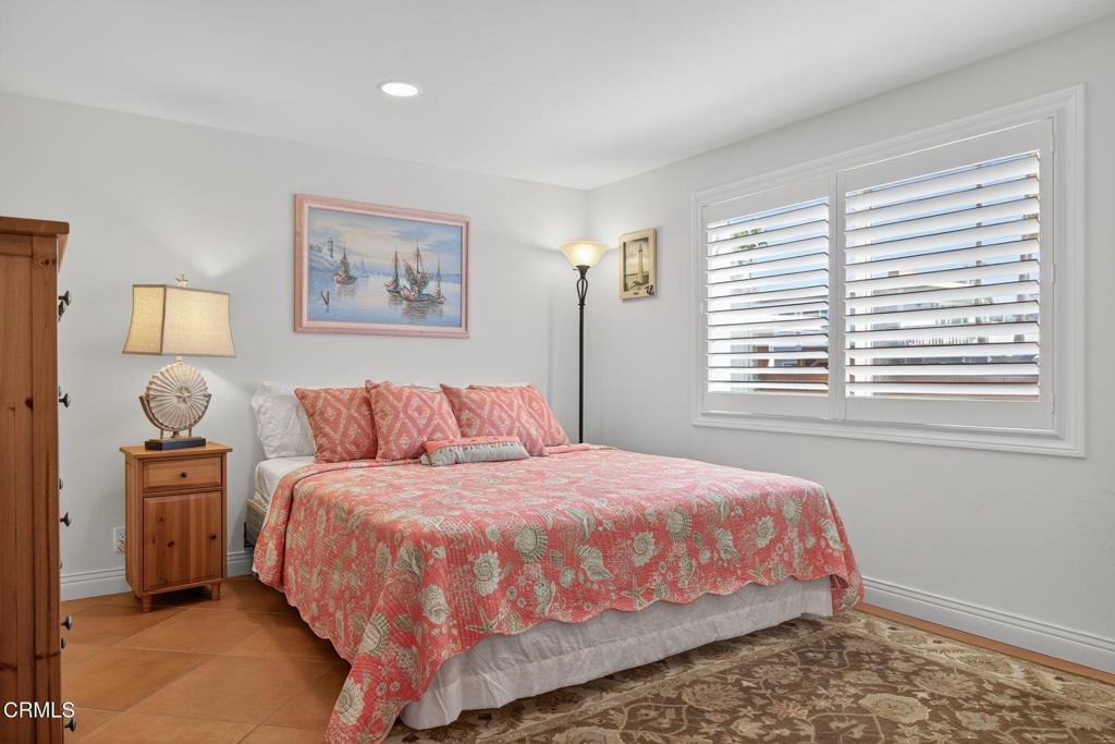 2408 Ocean Drive Oxnard, CA 93035 - Photo 38 of 58 a bedroom with a bed and a window