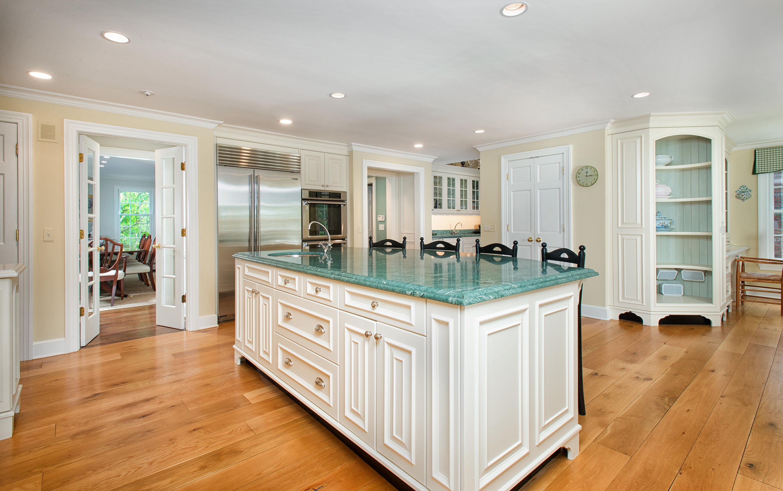 249 Nod Hill Road Wilton, CT 06897 - Photo 12 of 35 a kitchen that has a lot of cabinets and wooden floor