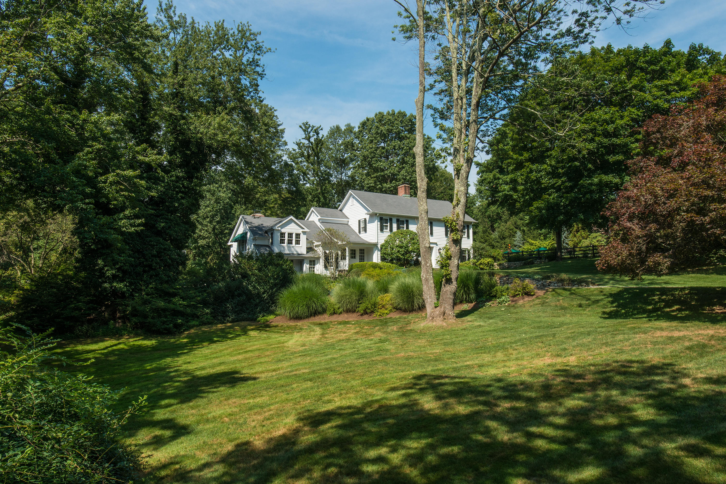 249 Nod Hill Road Wilton, CT 06897 - Photo 2 of 35 a view of a house with a yard