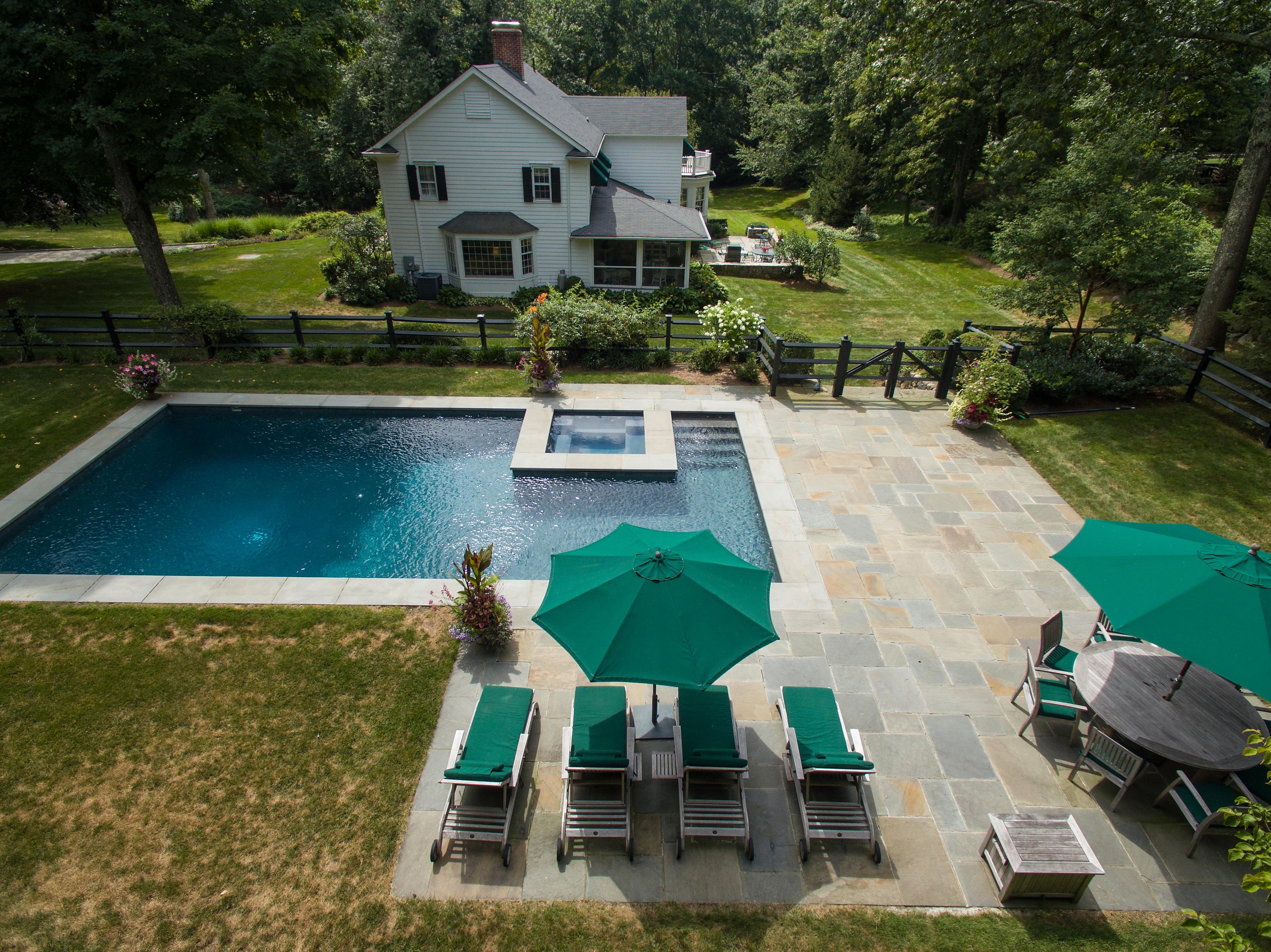249 Nod Hill Road Wilton, CT 06897 - Photo 27 of 35 a front view of a house with garden