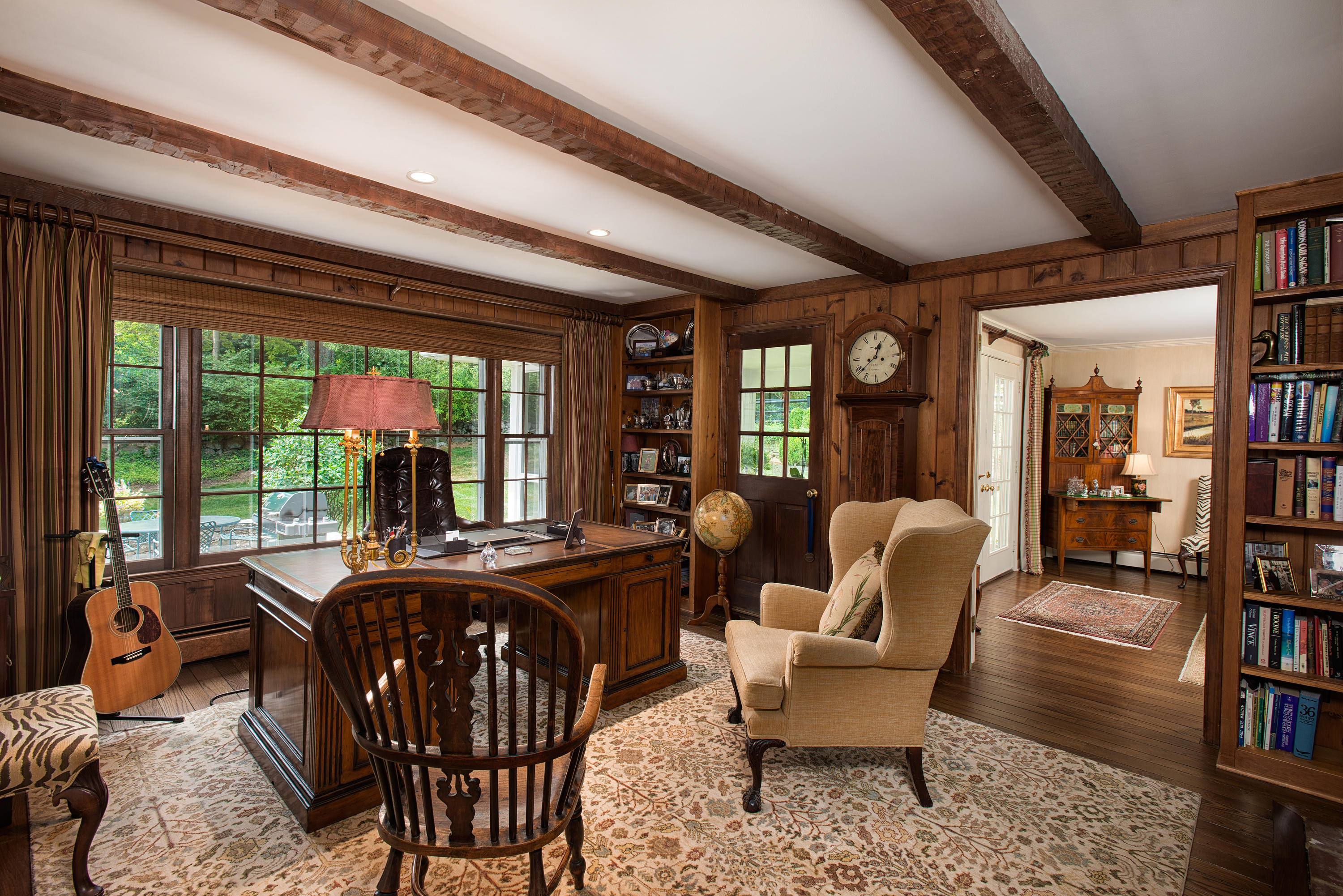 249 Nod Hill Road Wilton, CT 06897 - Photo 9 of 35 a view of a dining room with furniture window and wooden floor